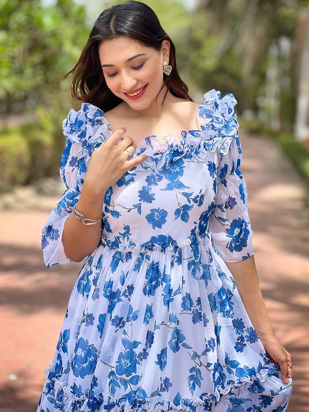 Close-up of White Jasmin dress with frill details