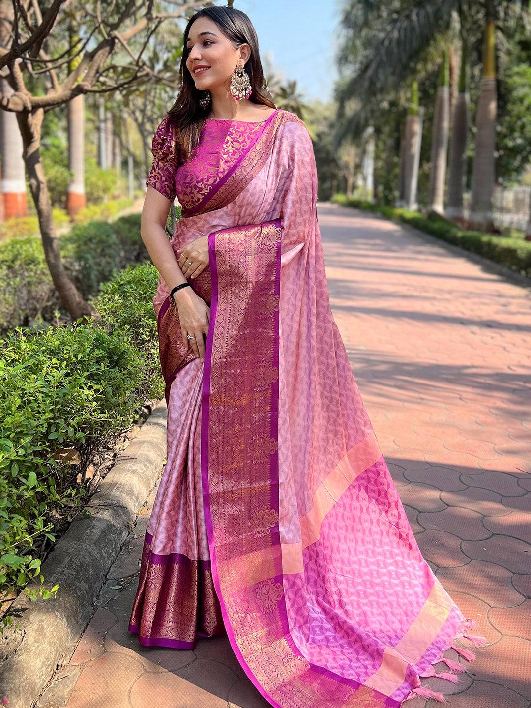 Beautiful pink Kanjivaram saree with rich zari patterns