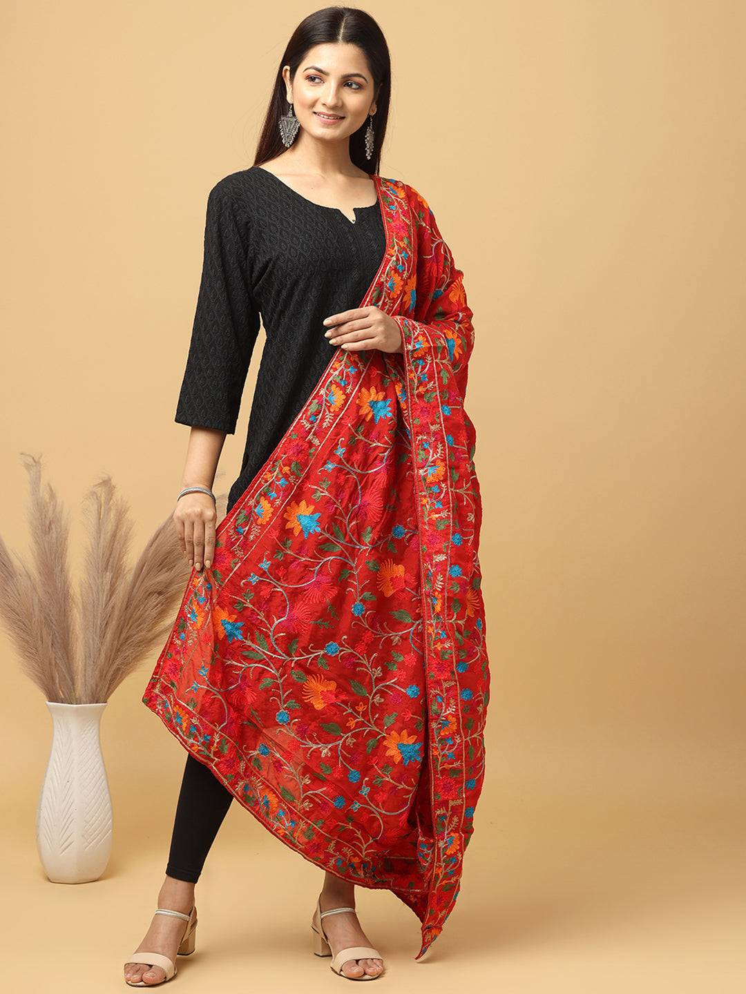 Model wearing red Bollywood poly chiffon pashmina dupatta.