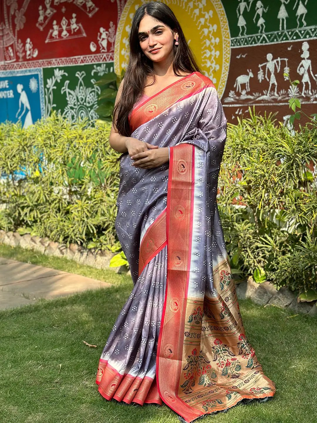 Outdoor view of model in silk saree with Minakari Pallu