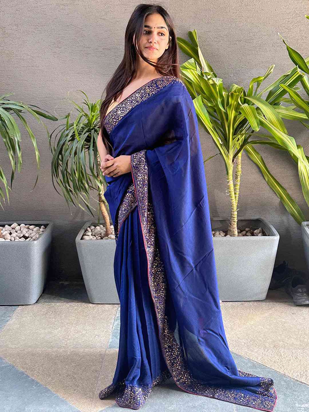 Designer navy saree featuring Swarovski embellishments
