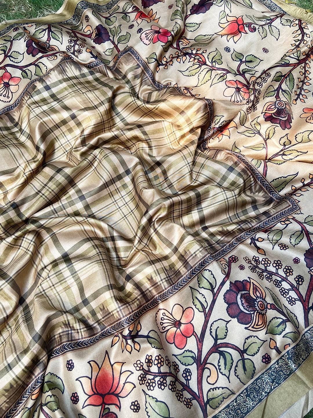 Elegant tussar silk saree featuring floral kalamkari motifs