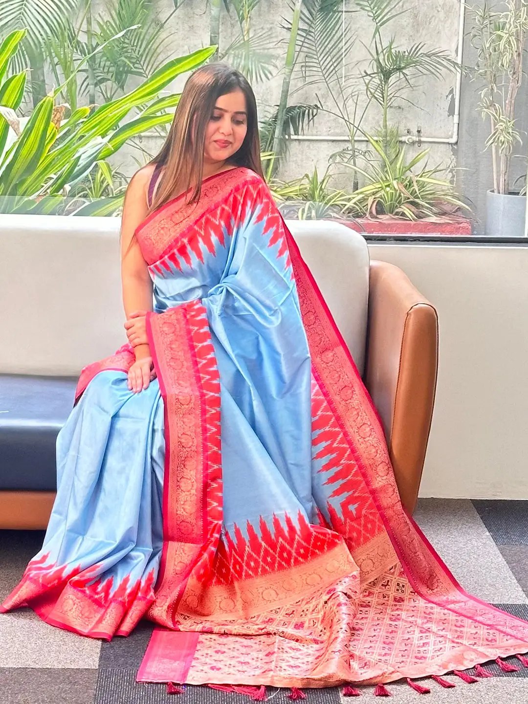 Chic blue Banarasi saree with red jacquard border detail