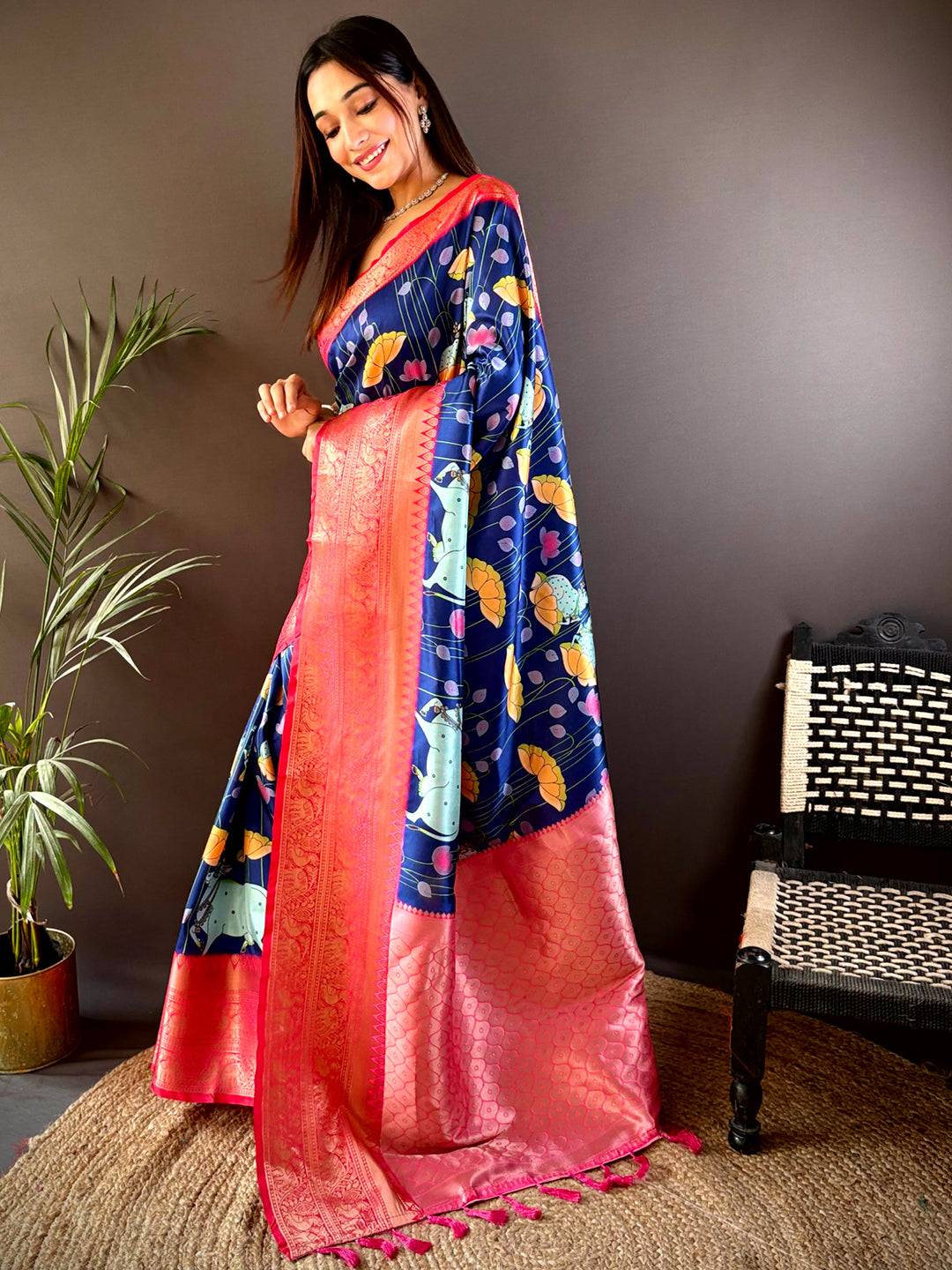 Stylish navy blue silk saree with Pichwai Kalamkari and pink border