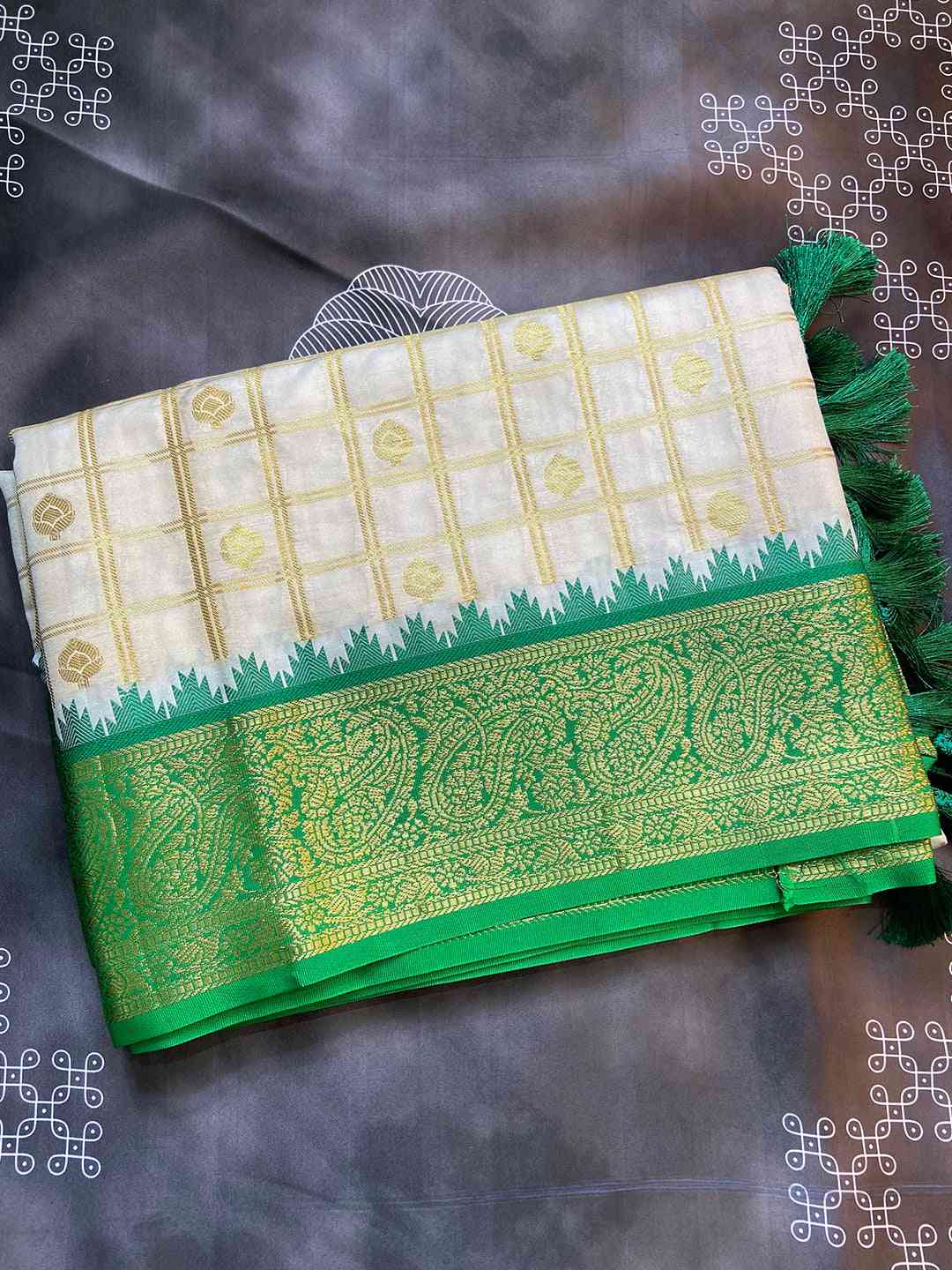 Folded Gadwal saree with green temple border and tassels