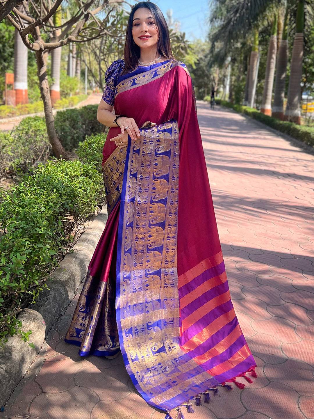 Elegant maroon saree with gold and blue detailing