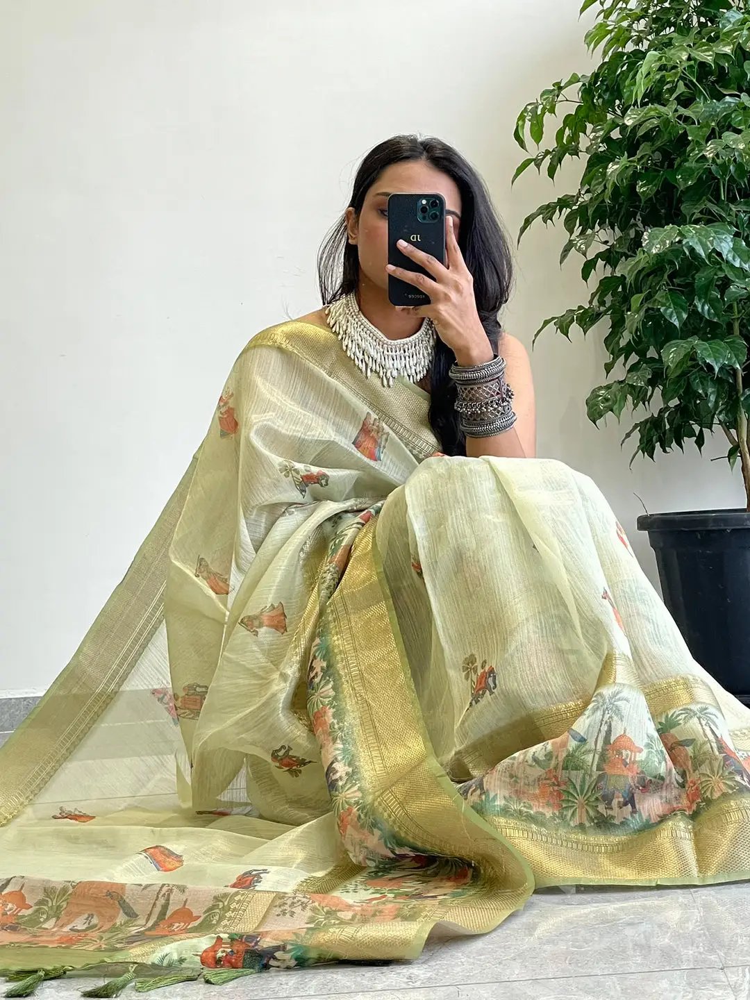Luxurious Soft Gold Zari Tissue Saree draped elegantly