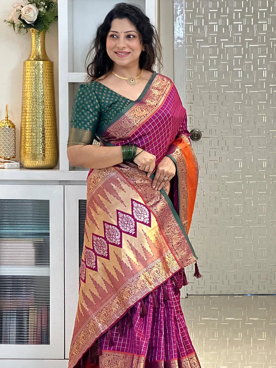 Traditional wine Banarasi silk saree with gold zari details