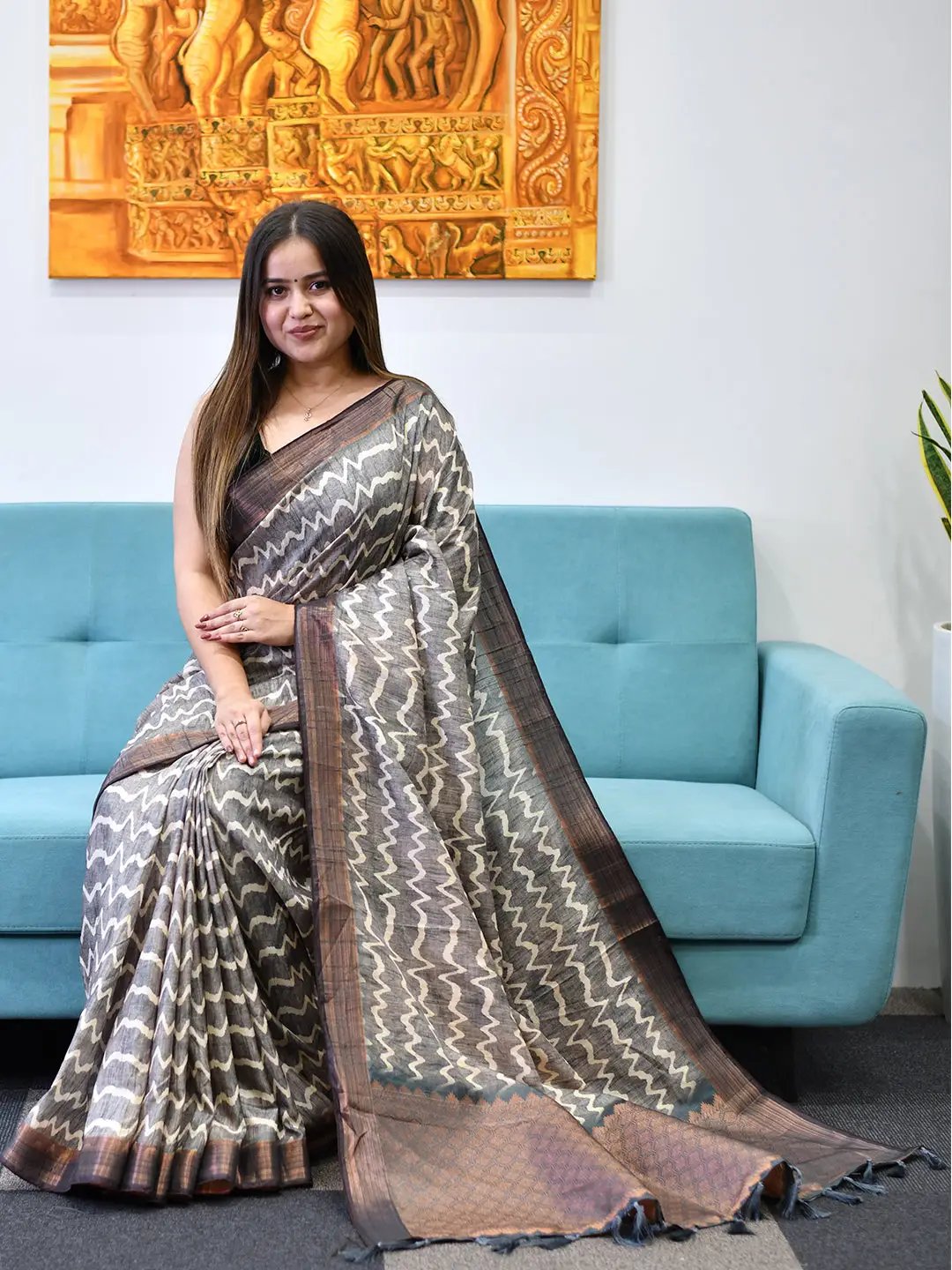 Elegant Tussar Ghicha Silk Saree with digital print on sofa