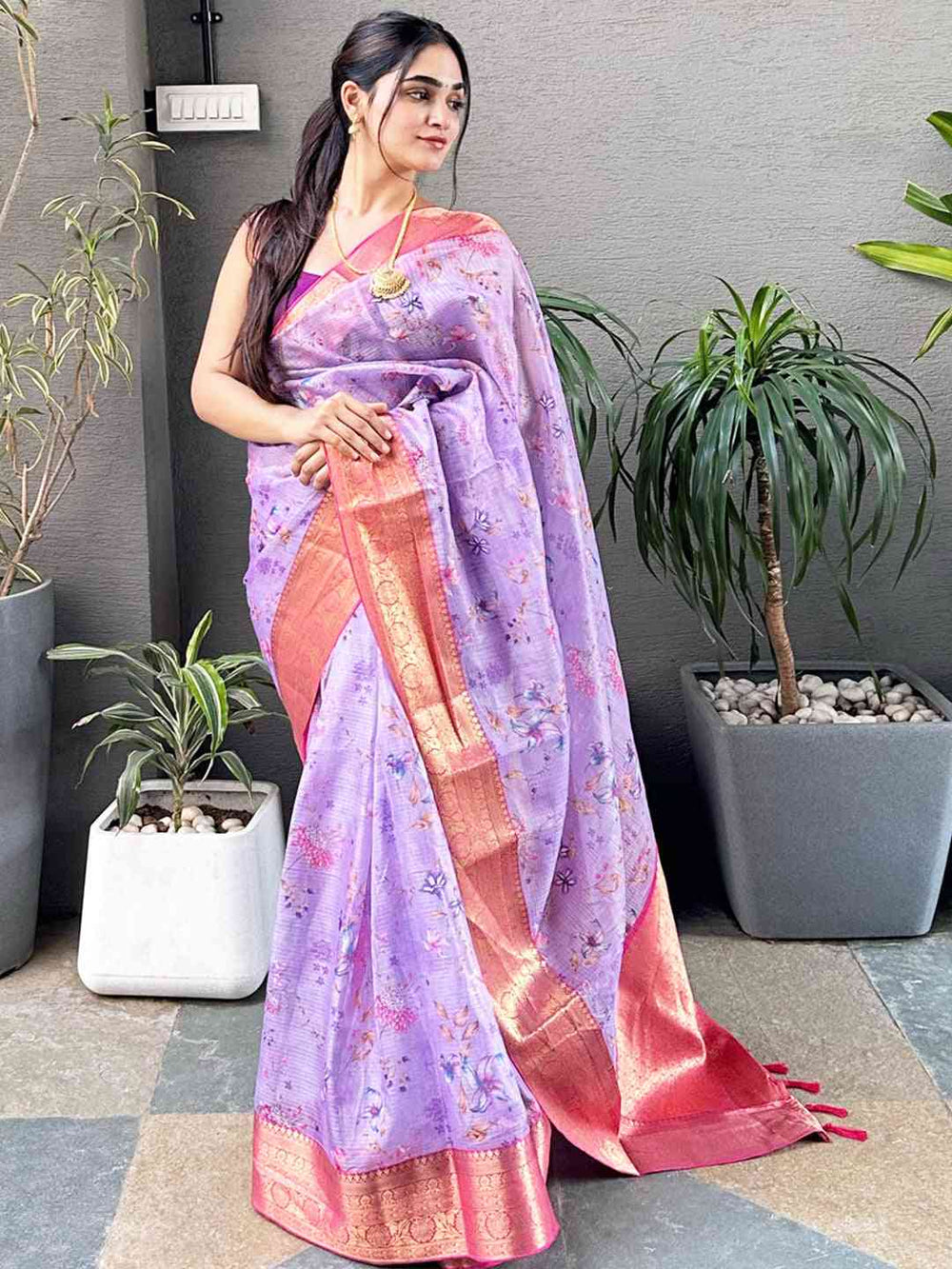 Elegant purple Kota silk saree with floral design and gold trim