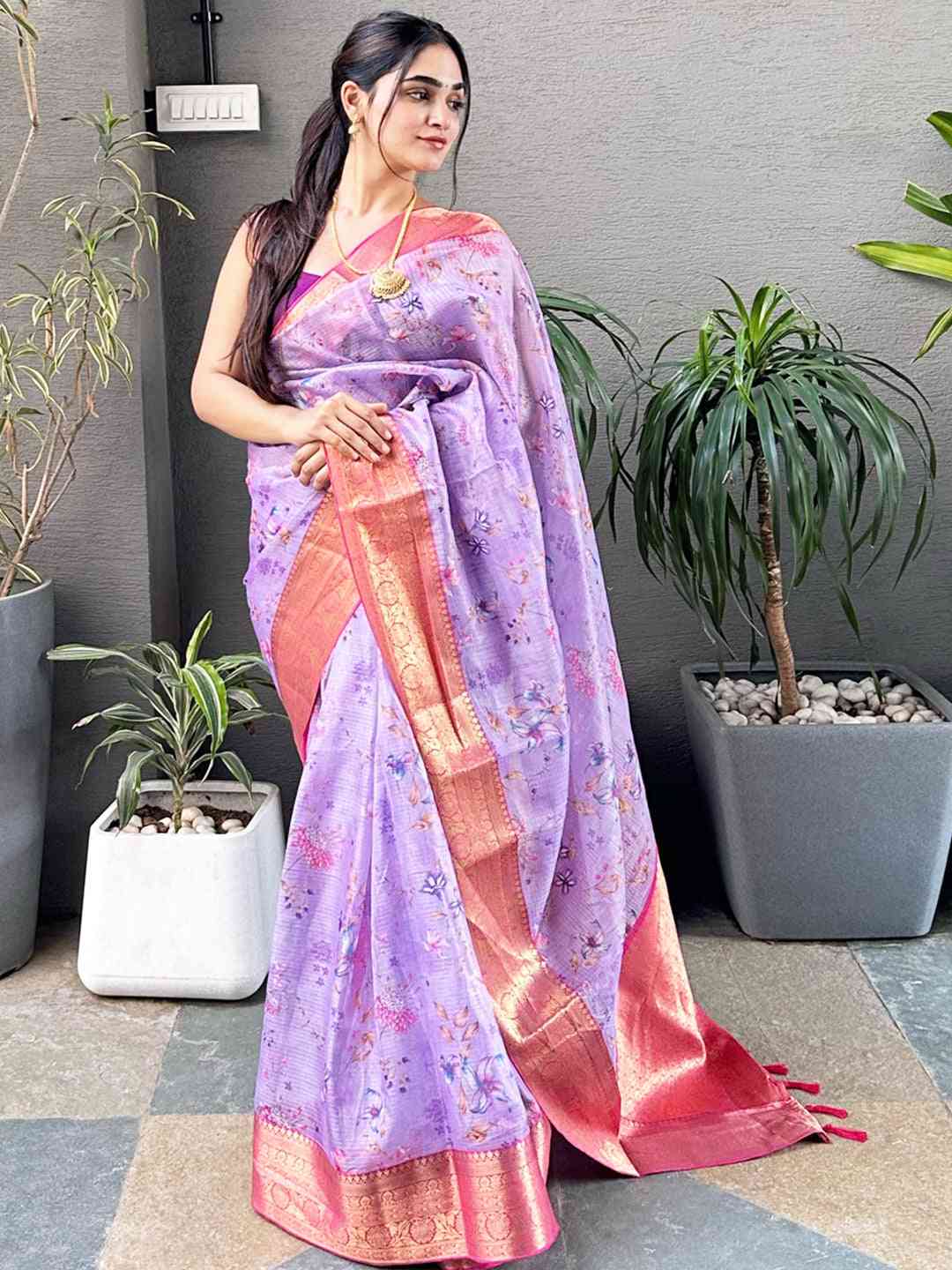 Elegant purple Kota silk saree with floral design and gold trim