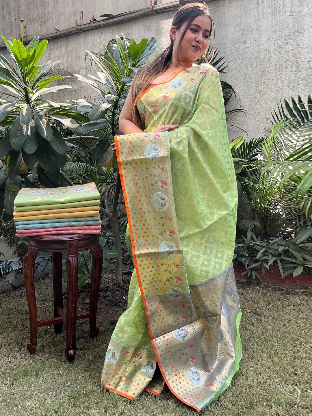 Elegant green Kota Doria saree with Minakari Patola design