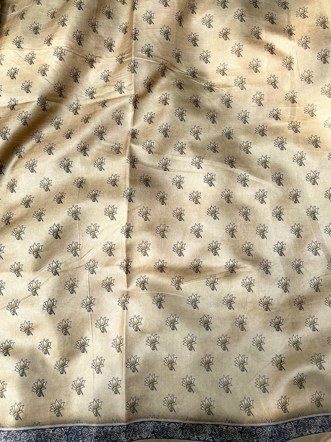 Close-up of tussar silk saree with delicate floral patterns