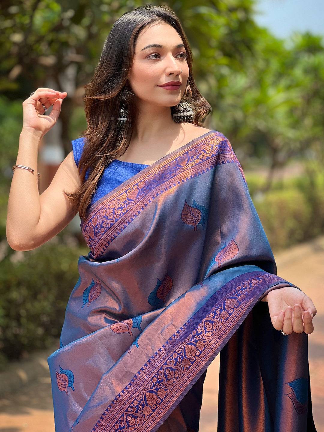 Navy Kanjivaram saree with gold zari weaving, front view