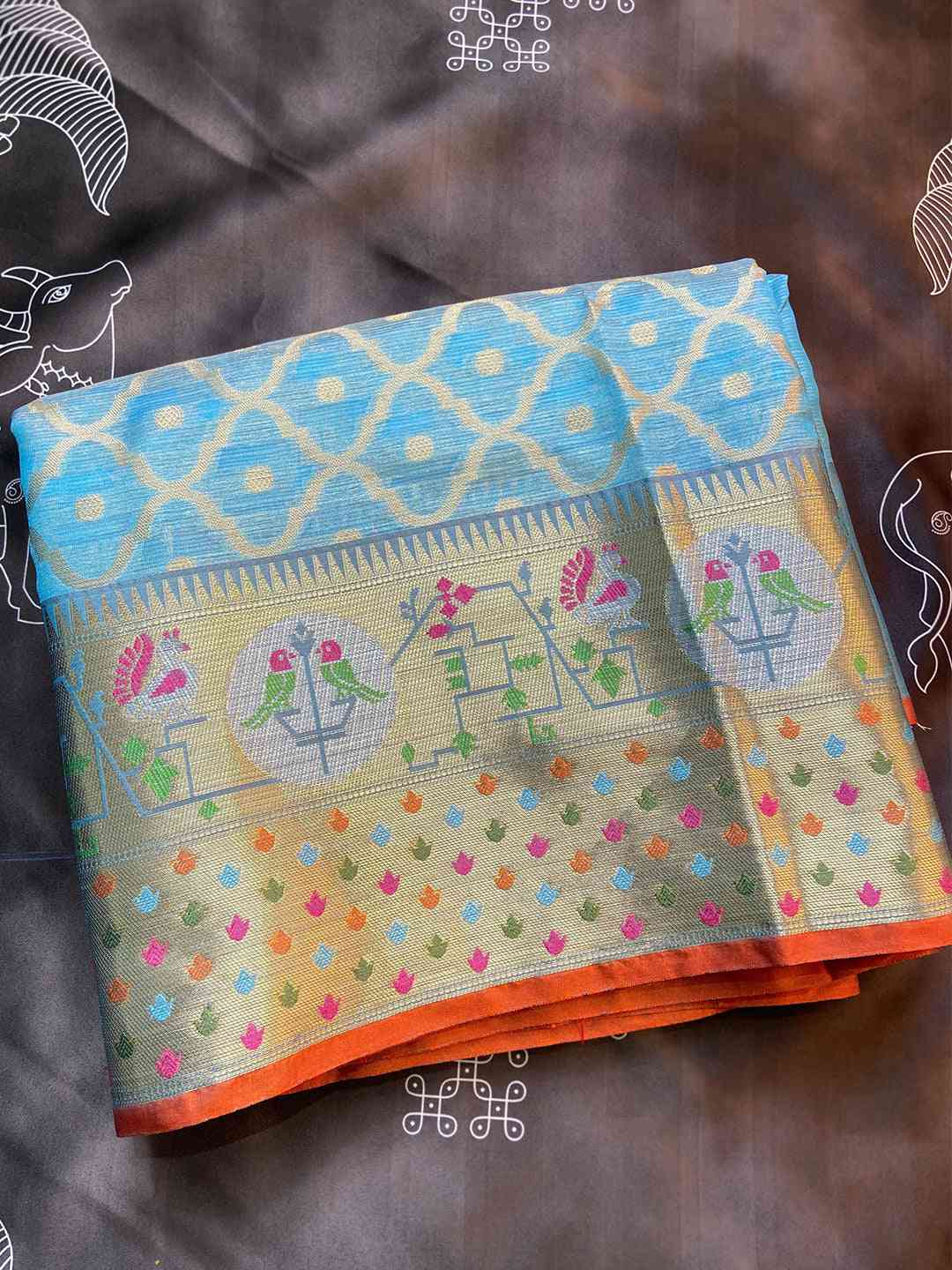 Folded Kota Doria Silk Saree showcasing Minakari Ikkat design