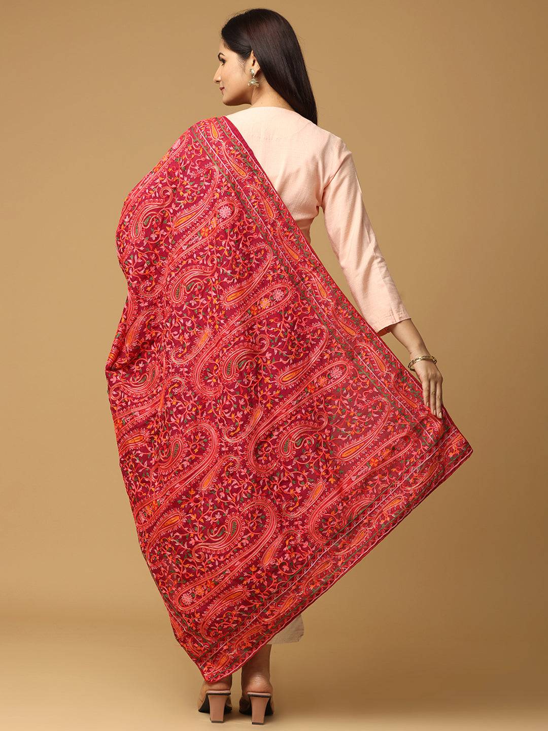 Back view of red dupatta showcasing detailed embroidery.