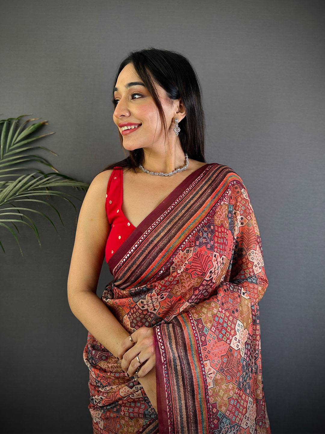 Rust Charm Mirror Work Silk Saree