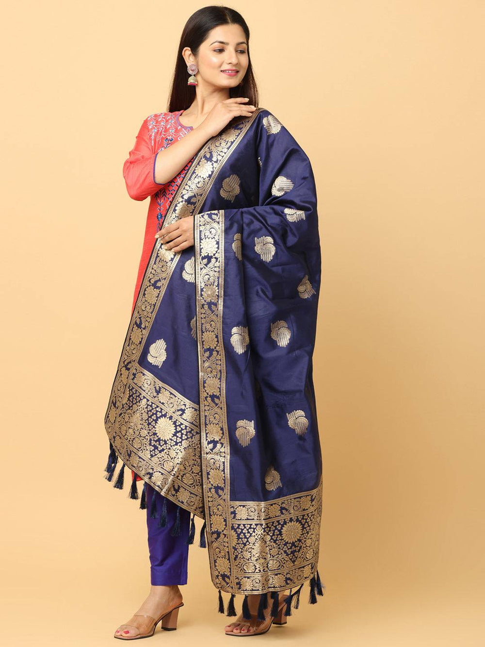 Model wearing silk blend dark blue dupatta with detailed woven design