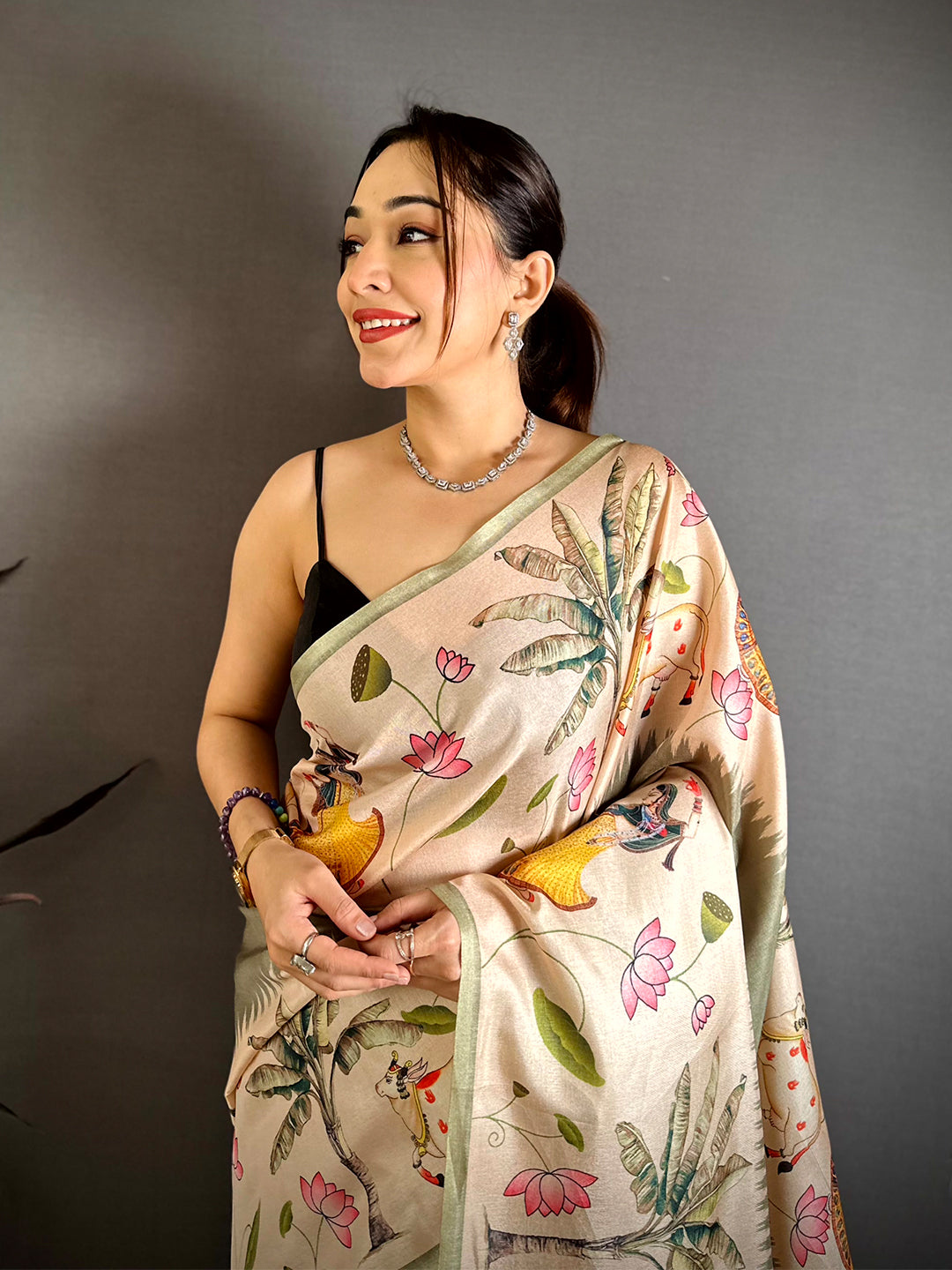 Regal Pichwai Border Semi Tussar Saree