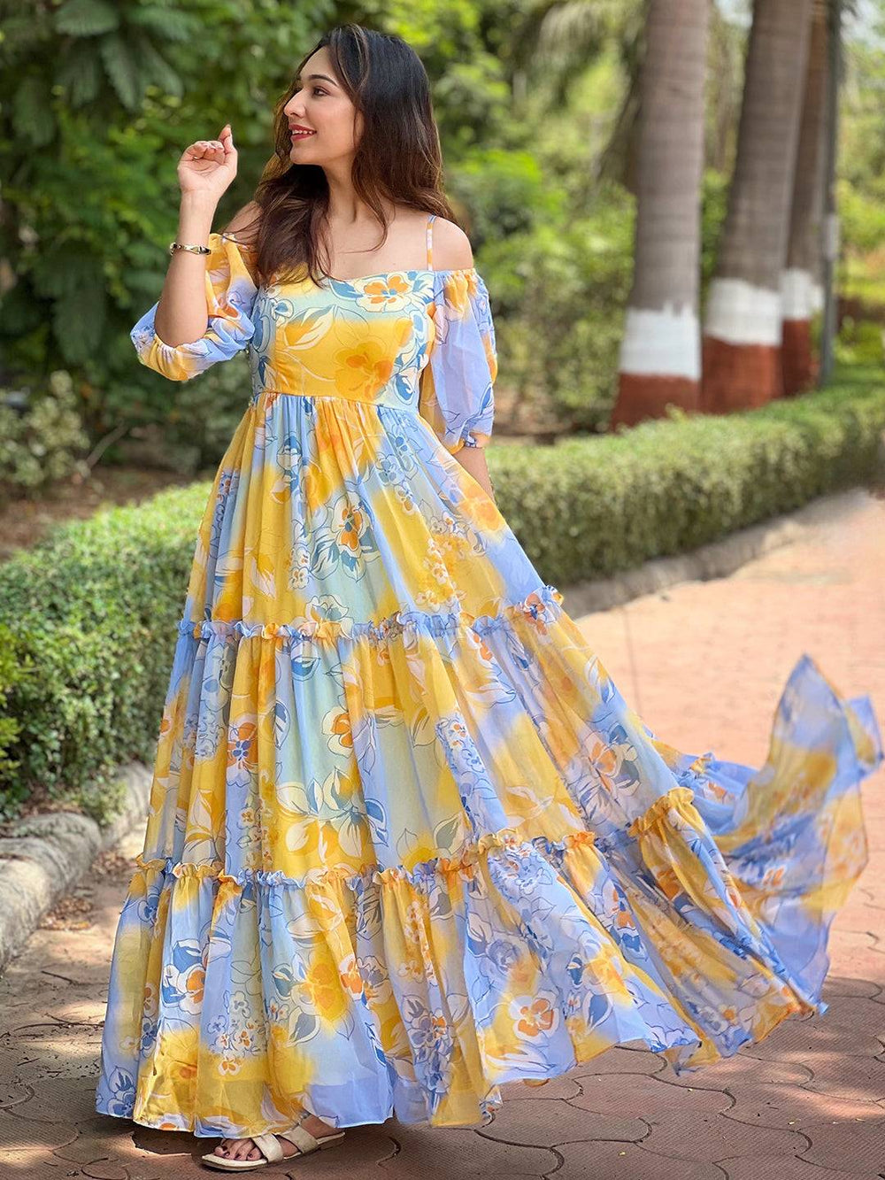 Masha Yellow Floral printed Dress flowing outdoors