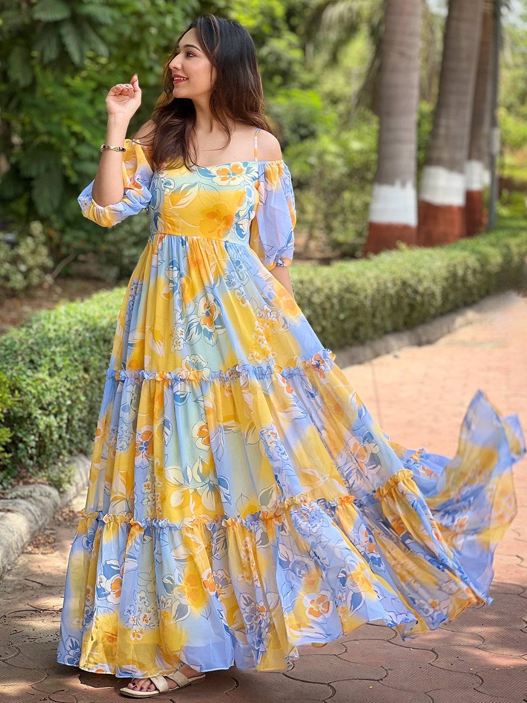 Masha Yellow Floral printed Dress flowing outdoors