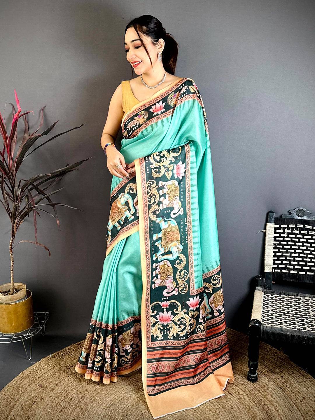 Turquoise Tanjore Elephant Tussar Saree