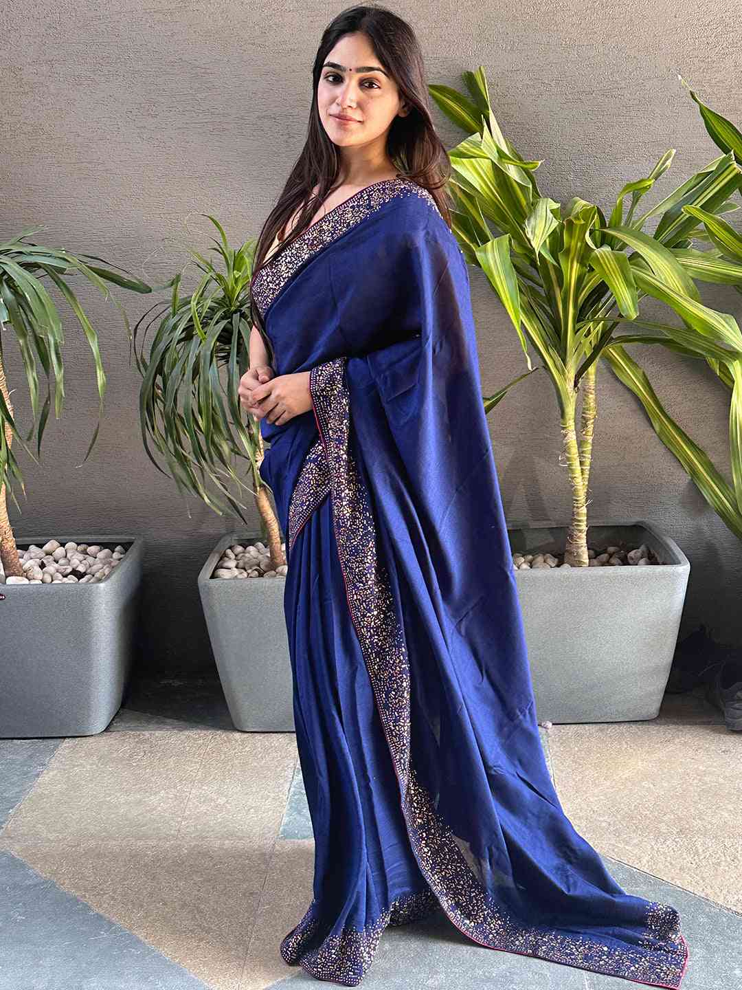 Elegant navy silk saree adorned with Swarovski stones