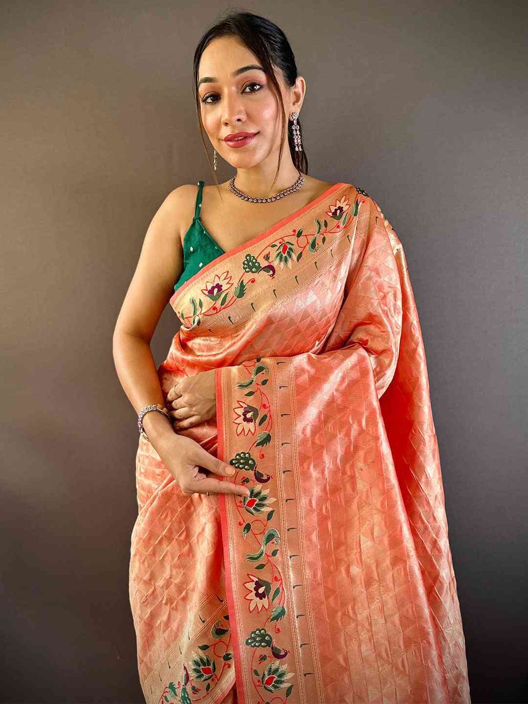 Peach silk blend Paithani saree with floral zari work