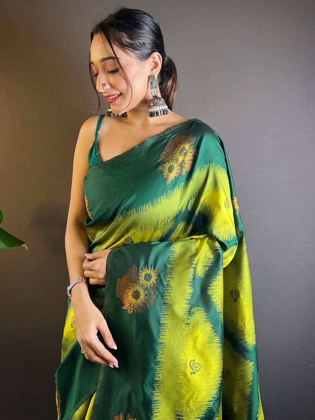 Green Tussar Silk Ikkat Weaving Saree with floral design