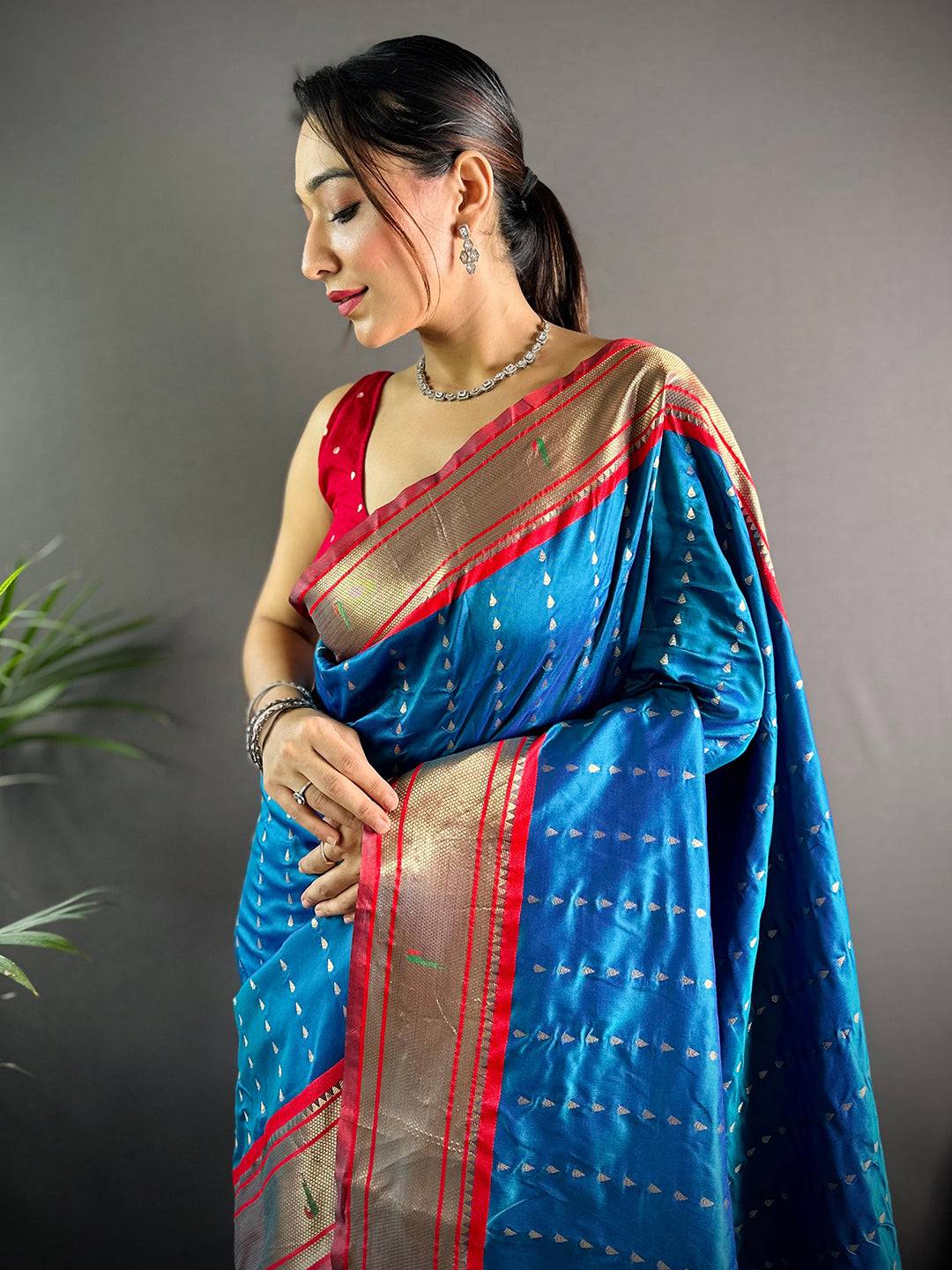 Royal Blue Yeola Paithani Saree with Zari Weaving, model posing