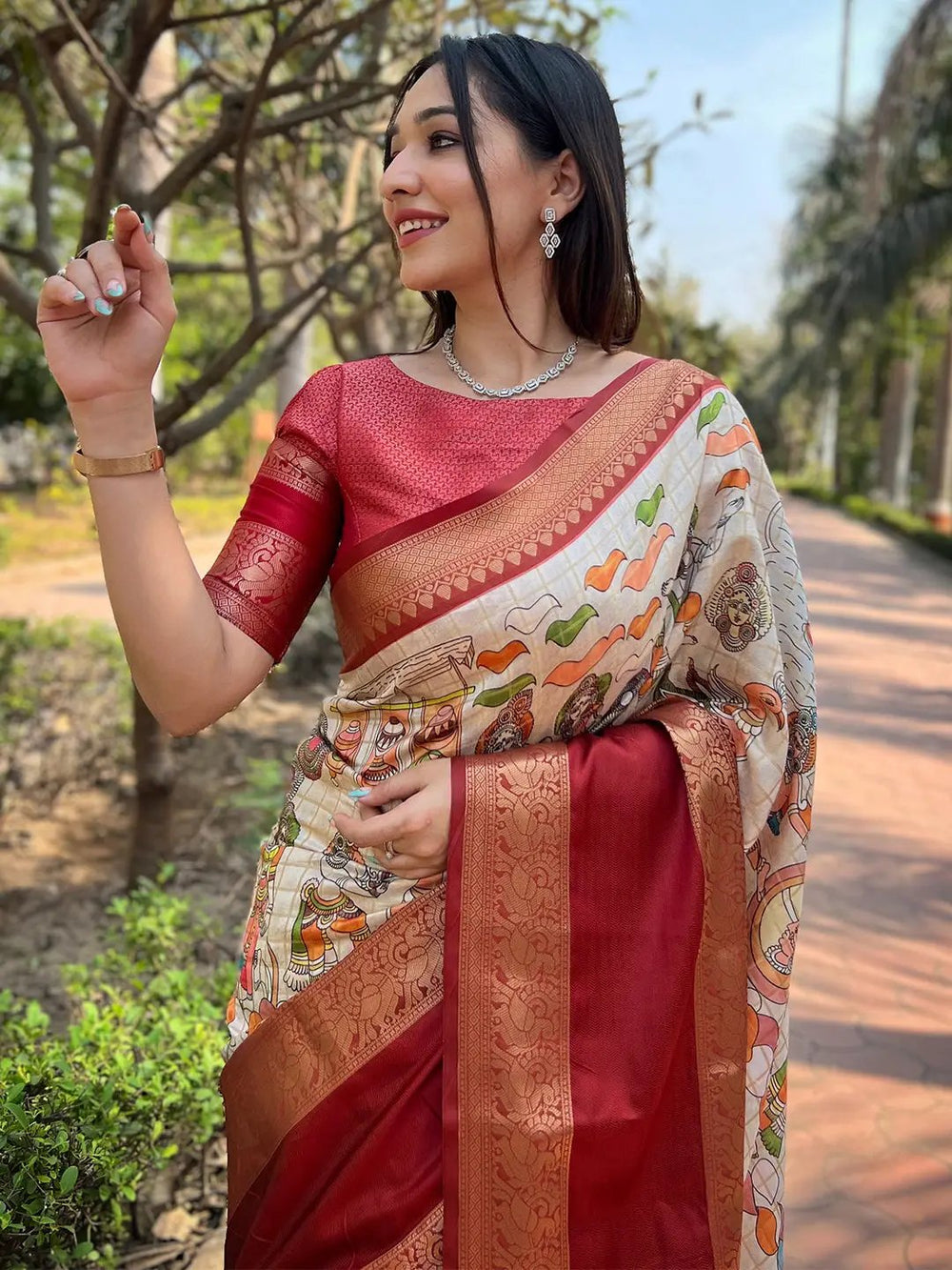 Traditional maroon Banarasi saree with rich border details