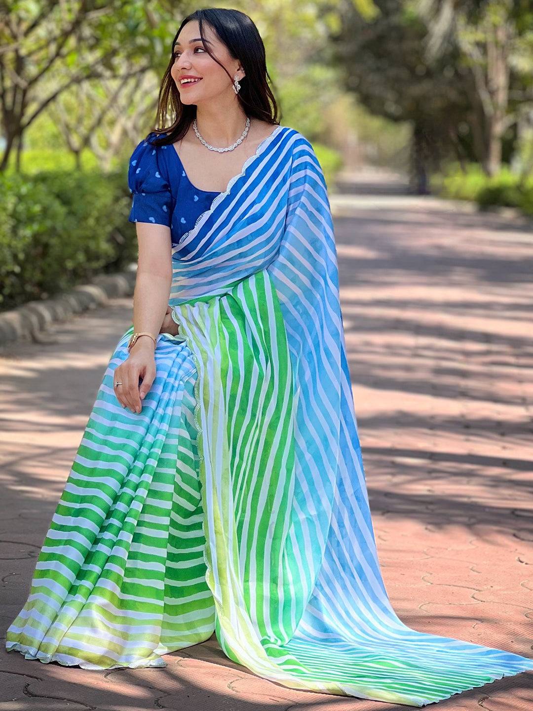 Stylish Leheriya Saree in vibrant blue and green