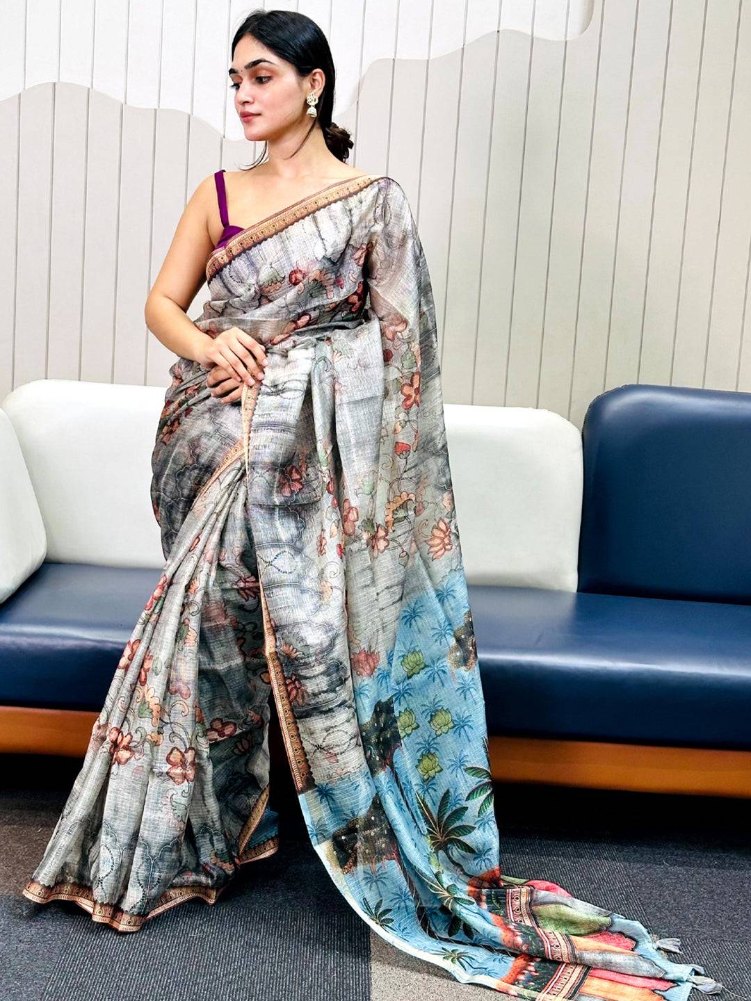 Elegant grey Kota Doriya silk saree with floral print displayed