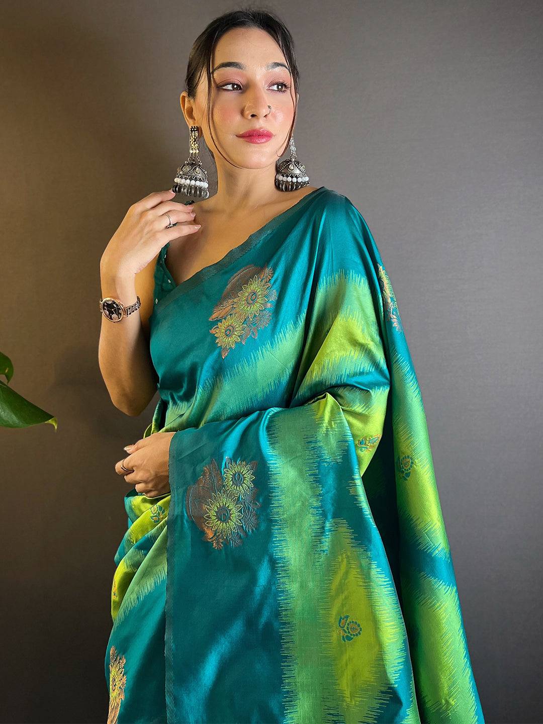 Parrot Green Tussar Silk Ikkat Weaving Saree draped elegantly.