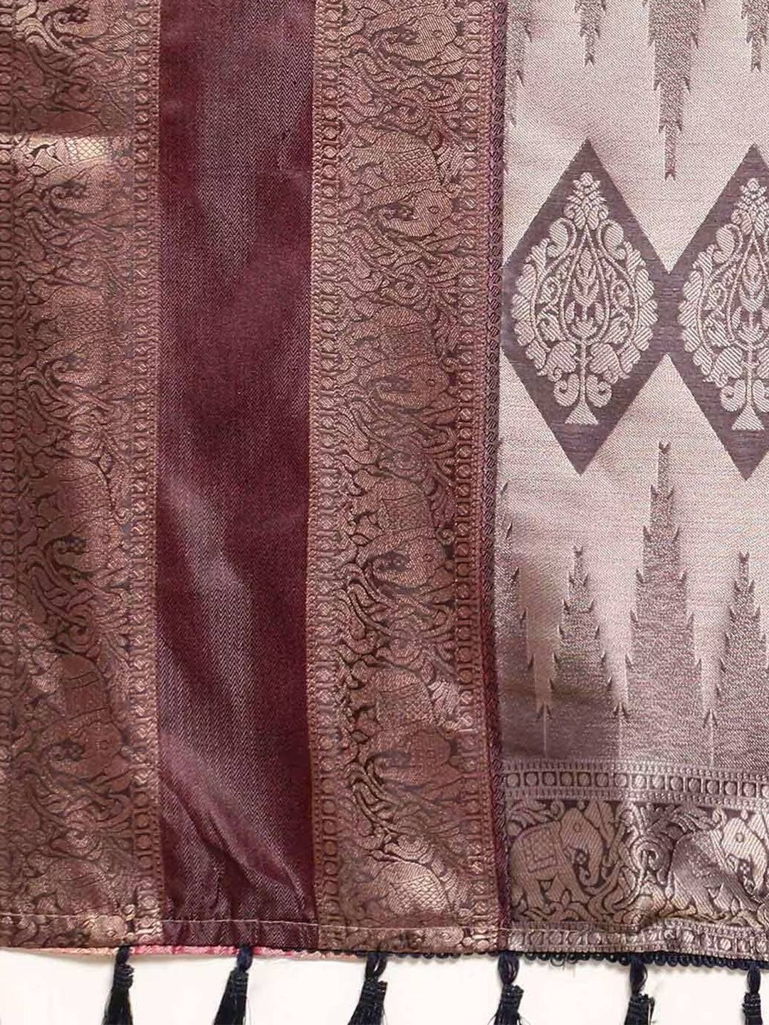Close-up of maroon and gold patterned border on silk saree