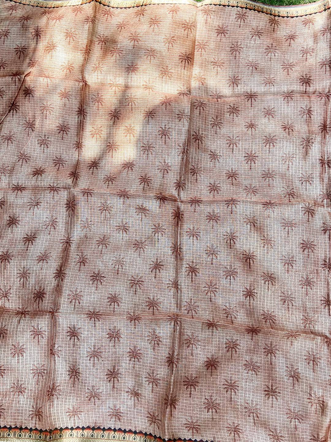 Reverse side of blue Kota Doriya silk saree with subtle palm prints.