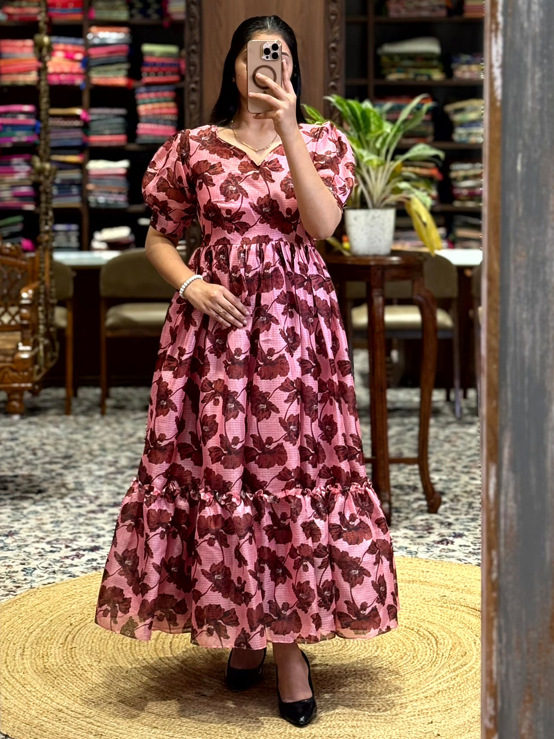 Chic Baby Pink Floral Print Midi Dress with a flowy silhouette and delicate floral pattern. Ideal for casual and semi-formal occasions, shop now.