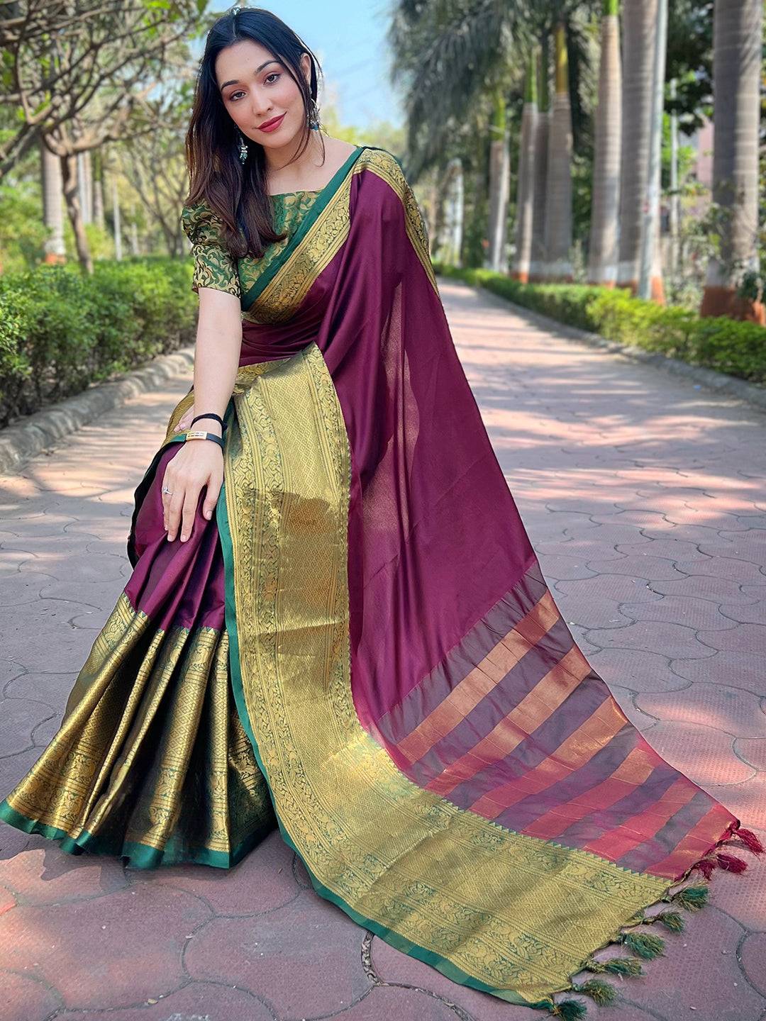 Full view of wine Kanjivaram saree with gold detailing