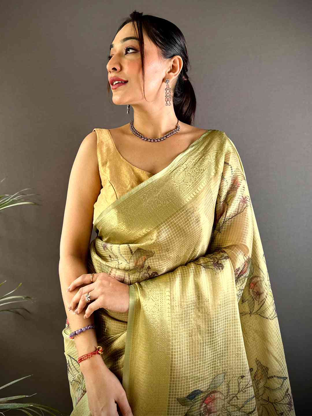 Stylish Olive Self Gold Zari Floral Print Saree