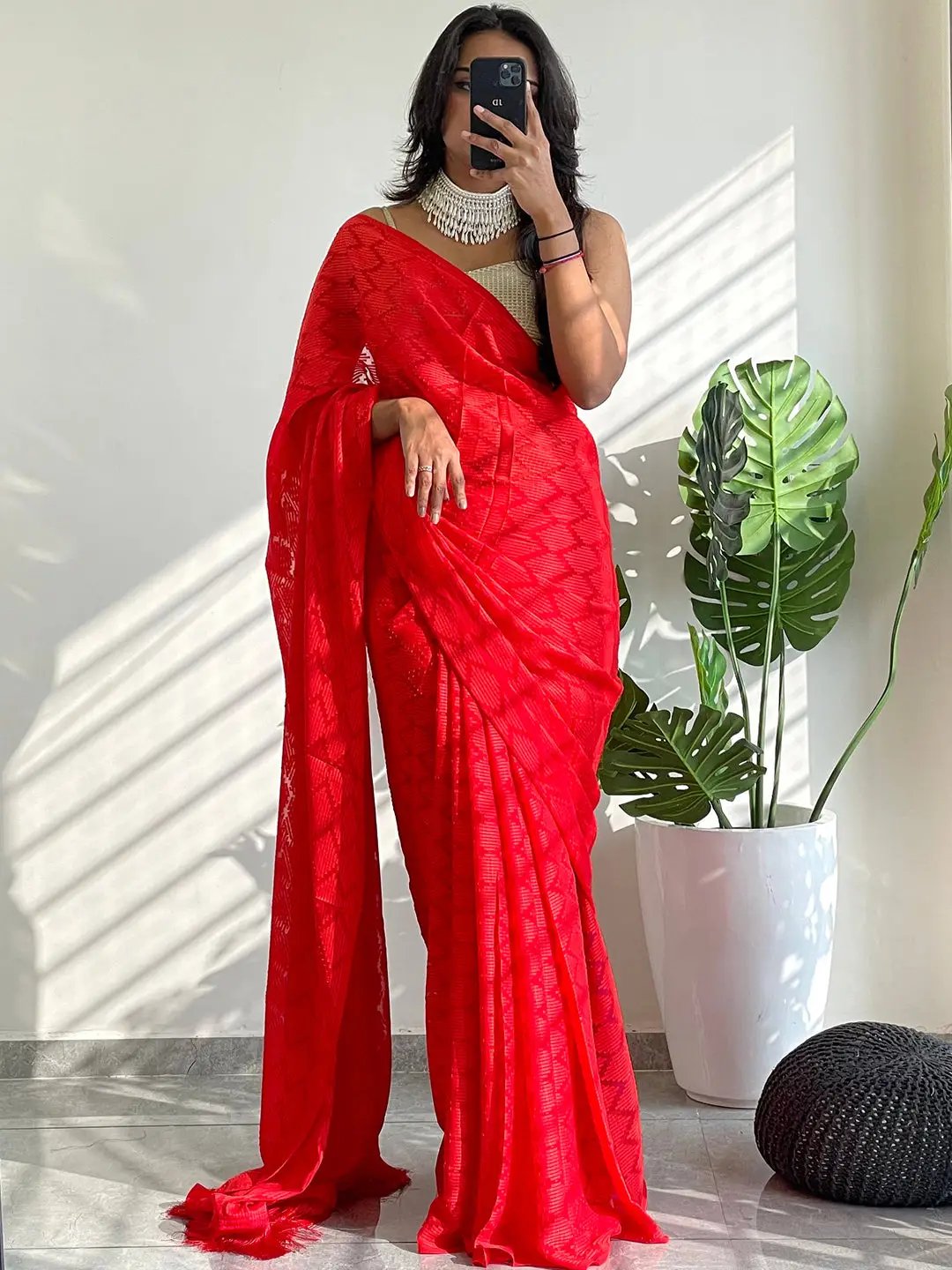 Fashionable red georgette saree perfect for parties