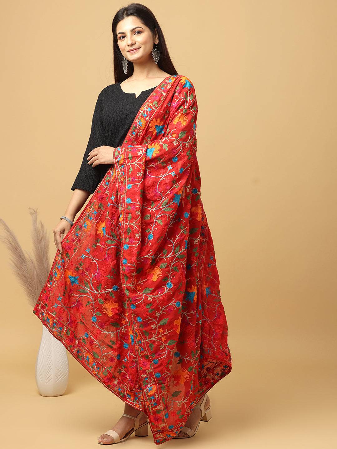 Elegant red Bollywood poly chiffon pashmina dupatta draped.