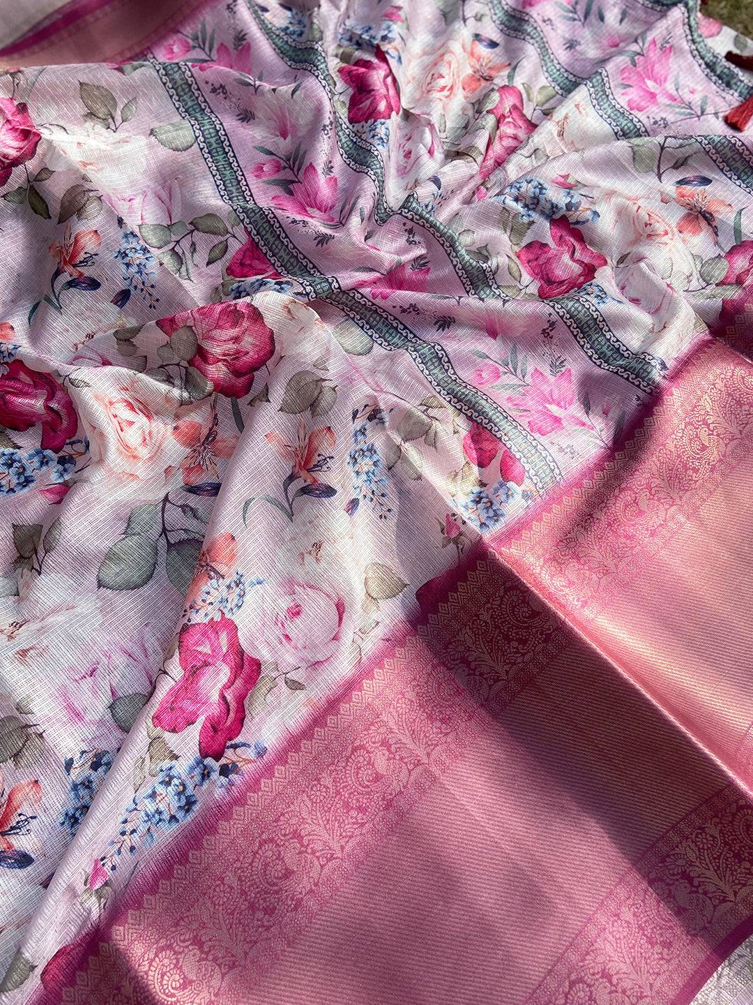 Detailed view of floral print on pink Kota Doriya saree