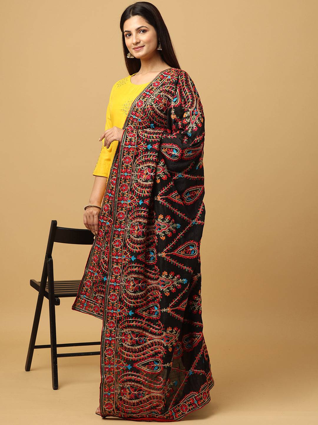 Side view of embroidered black pashmina dupatta