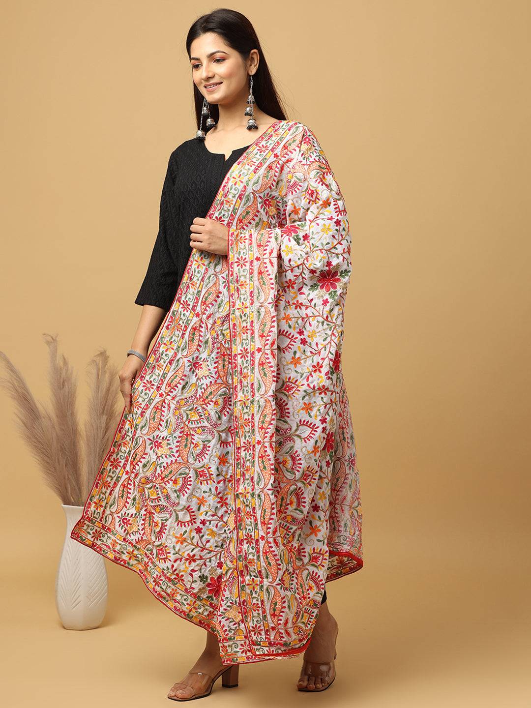 Elegant poly chiffon dupatta with intricate thread motifs.