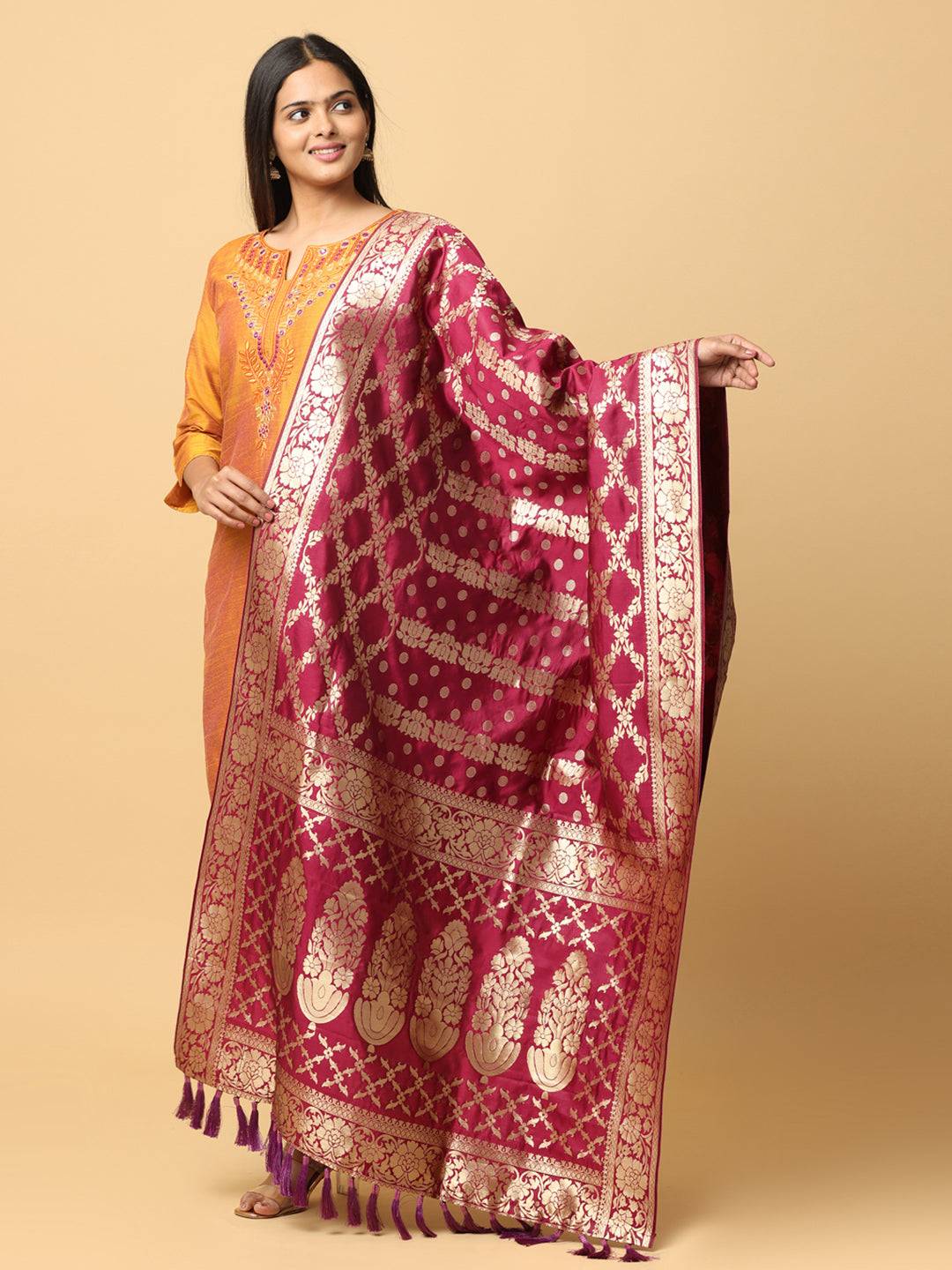 Model displaying traditional silk blend dupatta with tassels