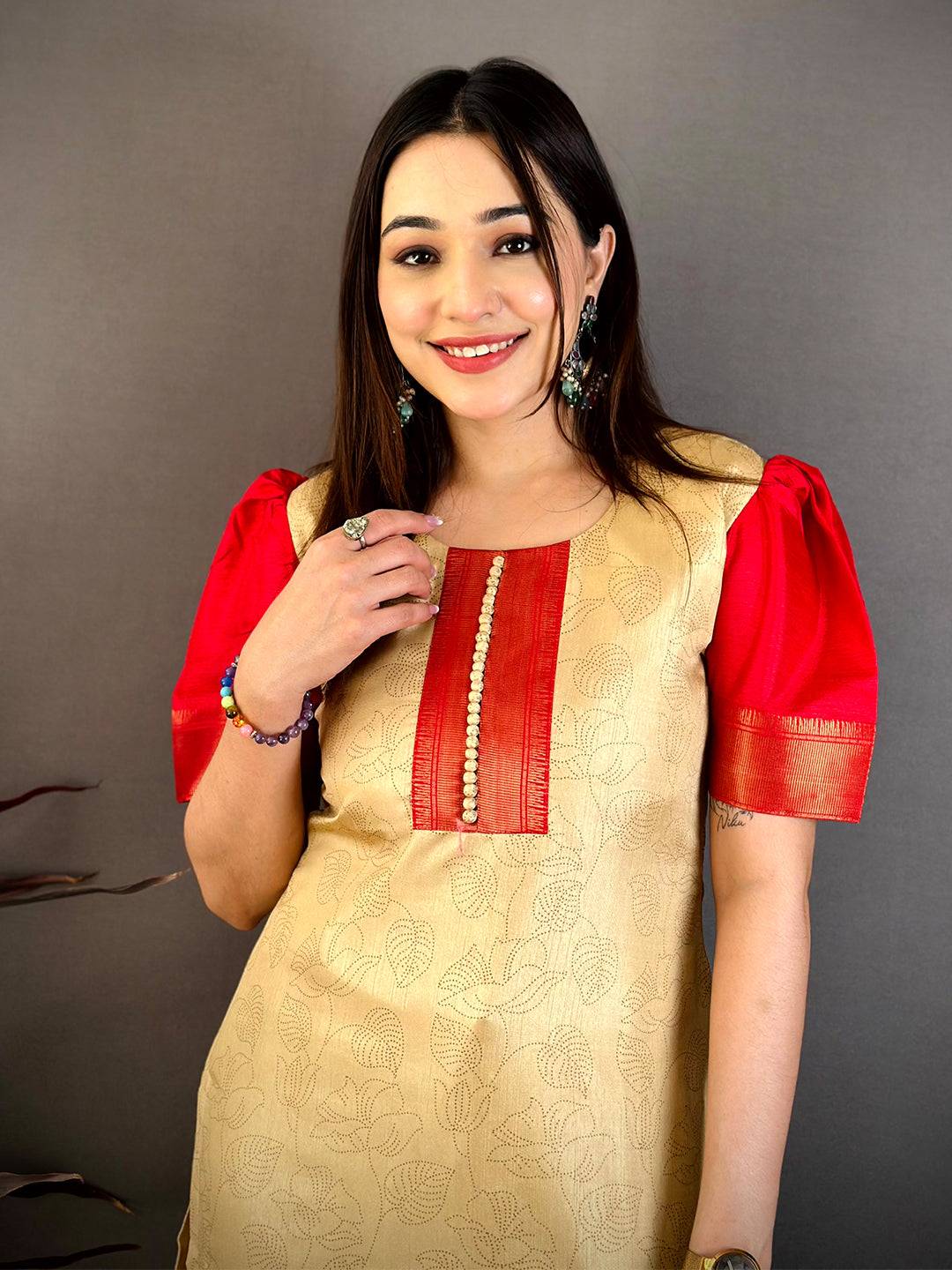 cream Kota Doriya dress, front view on a model with red yoke and red puff sleeves