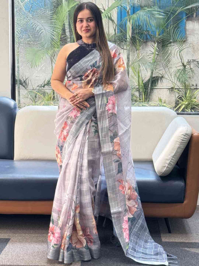 Elegant grey saree with floral motifs and zari chex pattern
