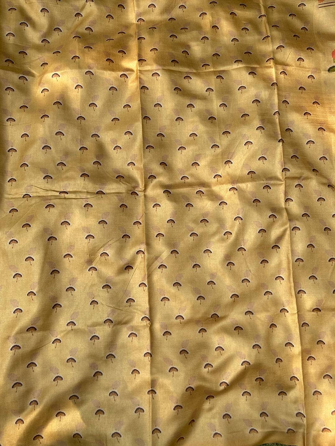 Detailed Pattern on Gold Tussar Silk Saree with Kalamkari Motifs