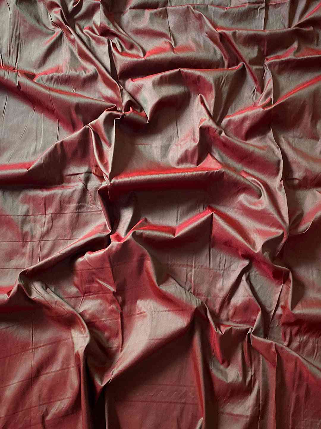 Fabric texture of Royal Red Paithani saree with zari weave.