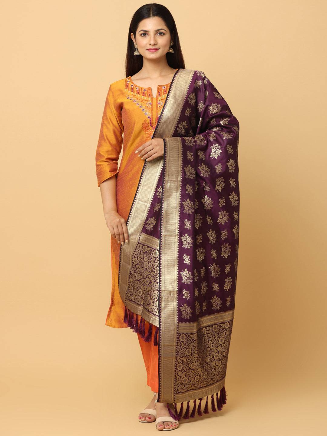 Model wearing wine silk blend dupatta with resham tassels